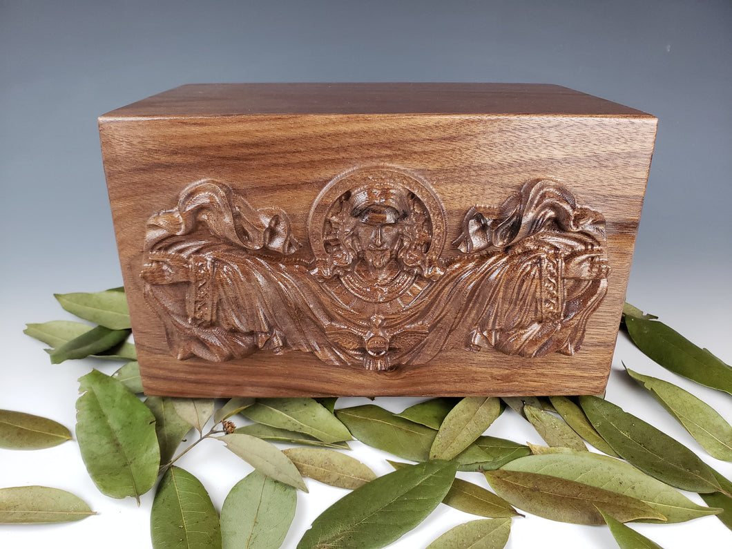 Large Walnut Urn with Religious carving